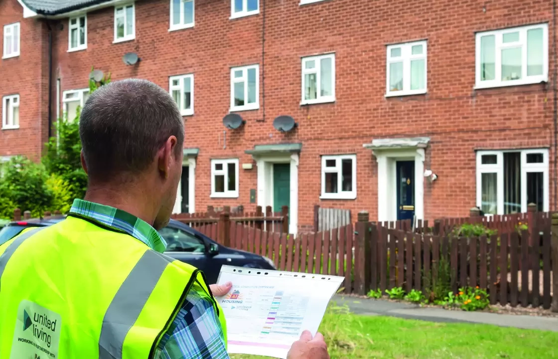 construction worker outside residential home