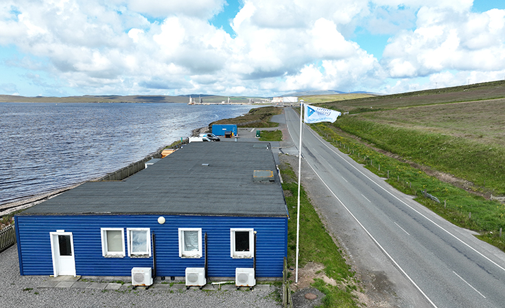 oil and gas terminal with united living flag
