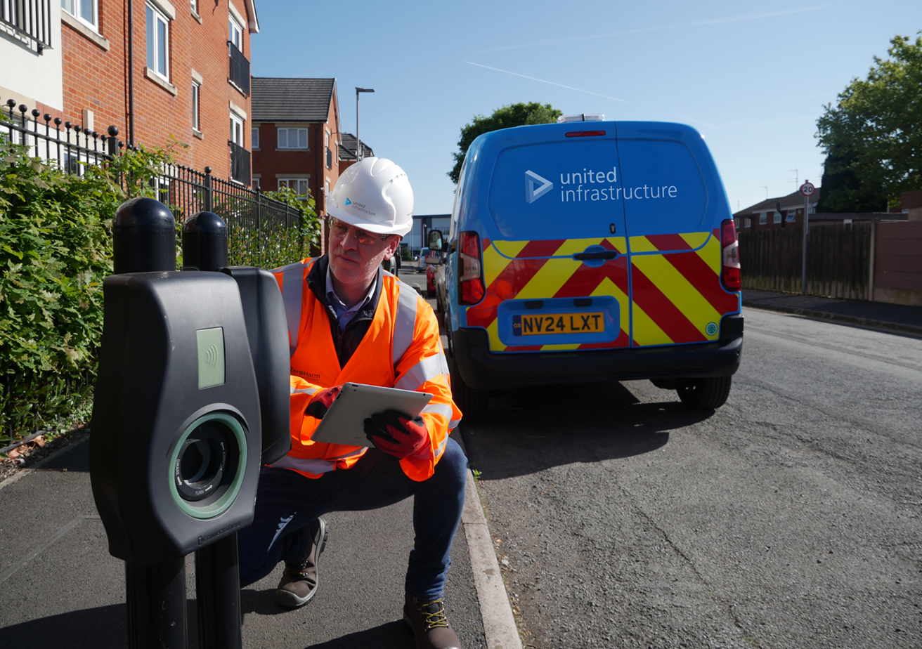 UI Employee checking a meter