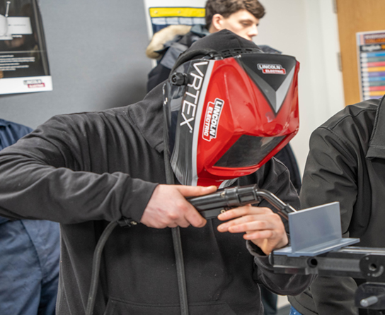 welding student at college welding