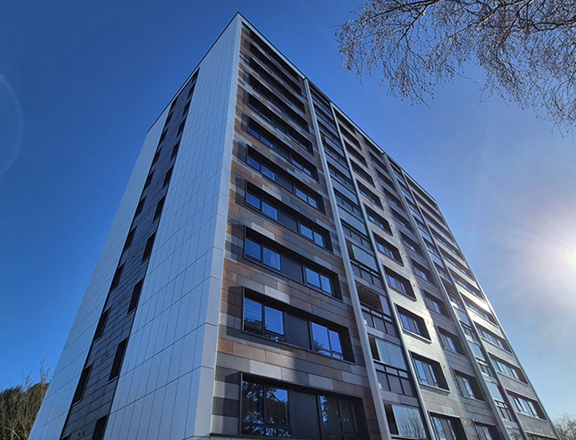 ground floor view of multi-storey building with new cladding