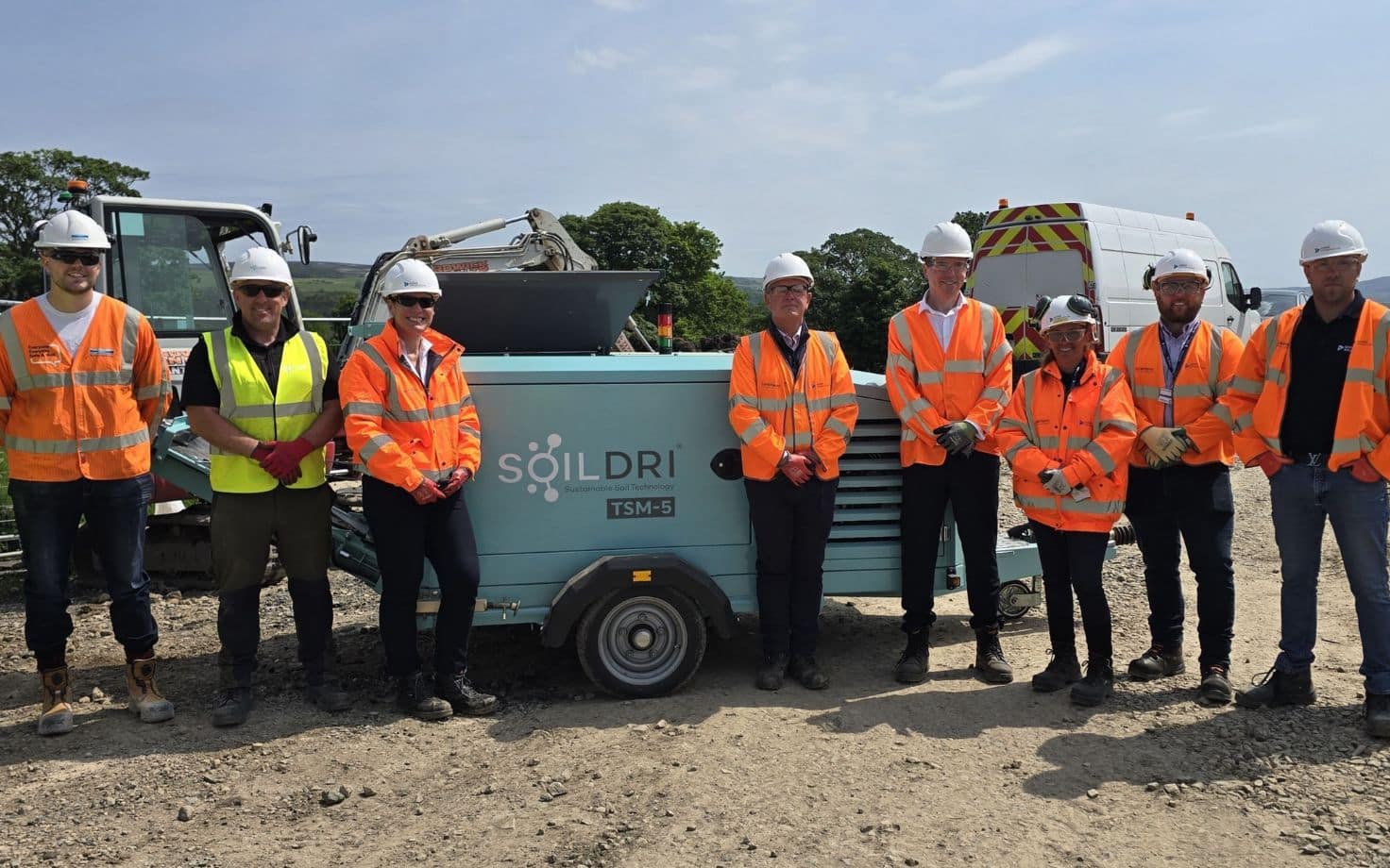 The United Infrastructure and SoilDri teams pictured alongside the TSM-5 soil mixing machine following the launch of a national partnership. Dan Macey, Director of Strategic Growth at SoilDri, is pictured third left, with Kelly Macfarlane, Managing Director of United Infrastructure Water, fourth left.
